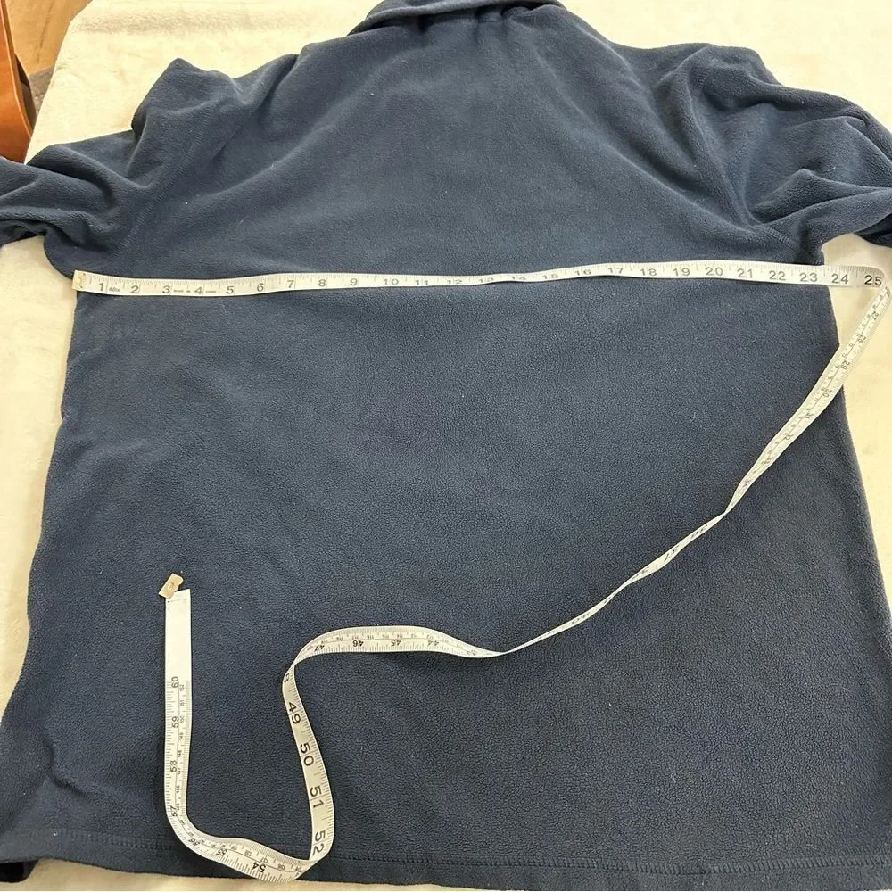 The North Face‎ blue men’s fleece 1/2 zip jacket size L